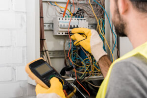 cropped-image-of-electrician-checking-electrical-b-2024-11-17-04-33-29-utc2.jpg
